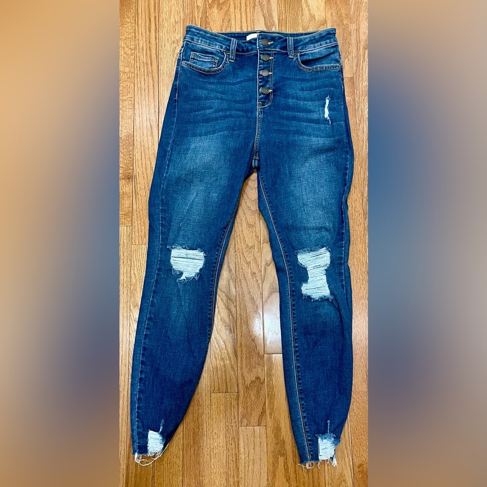 Boutique brand jeans frayed ankles, knees, and pockets. Size 11 EUC.